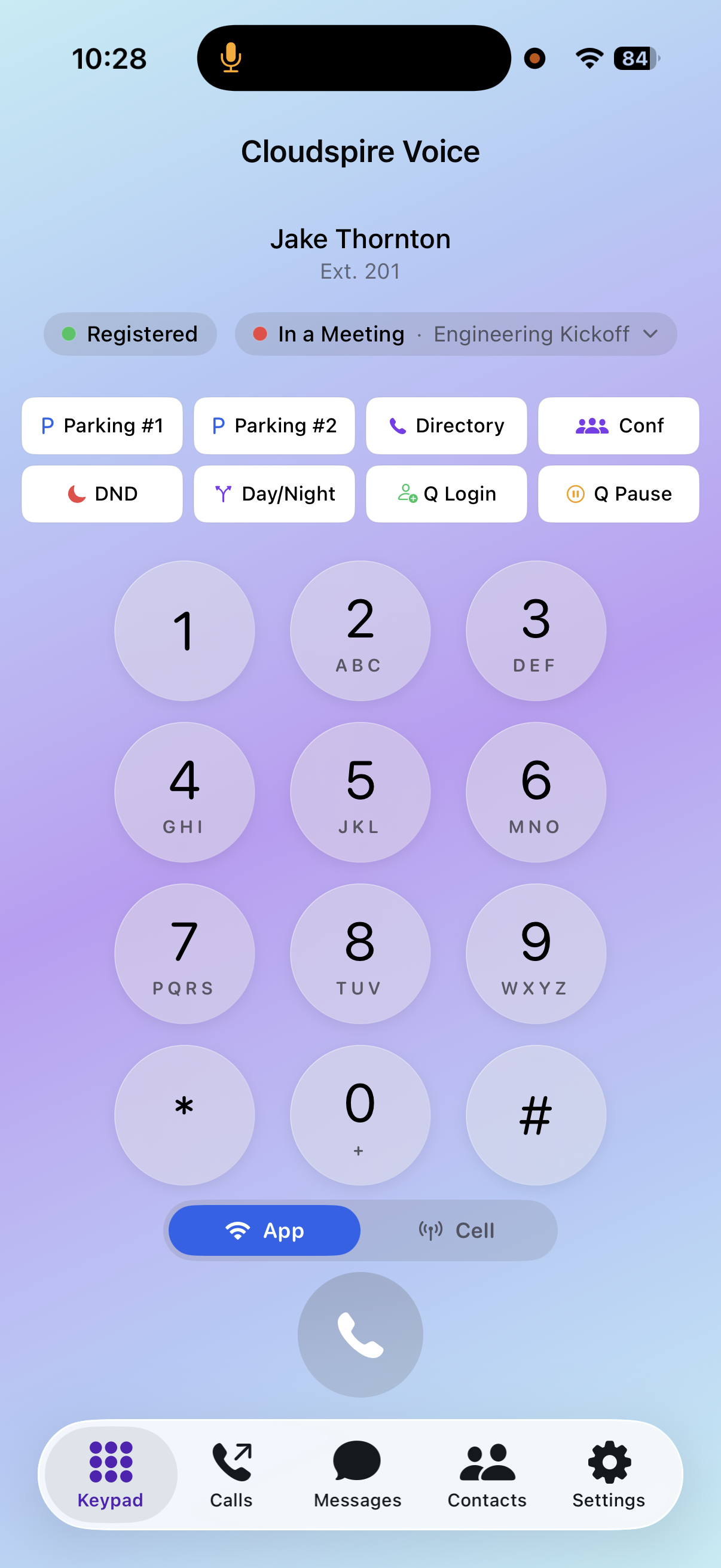 iOS app keypad showing the App vs Cell dial-mode toggle at the bottom — Cell mode is the Cellular Callback feature that rings the user's mobile first, then bridges through the company trunk with the business caller ID